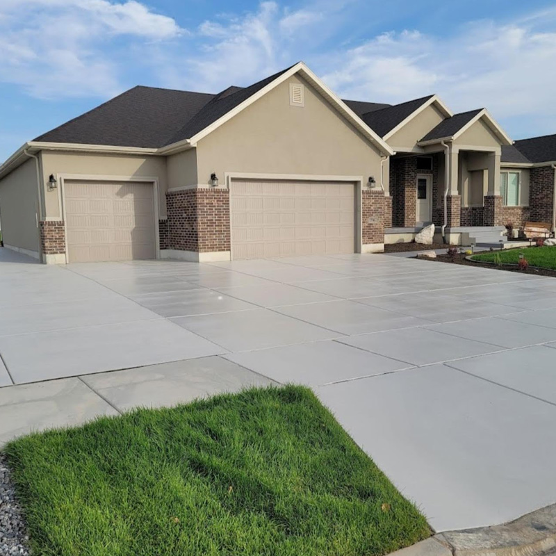 house and driveway that has been sealed